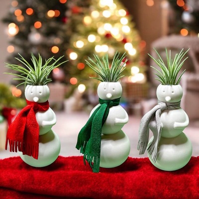  FIGURA DE CERÁMICA CON PLANTA DEL AIRE