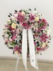 Corona de 70 cm de flores variadas tonos rosados